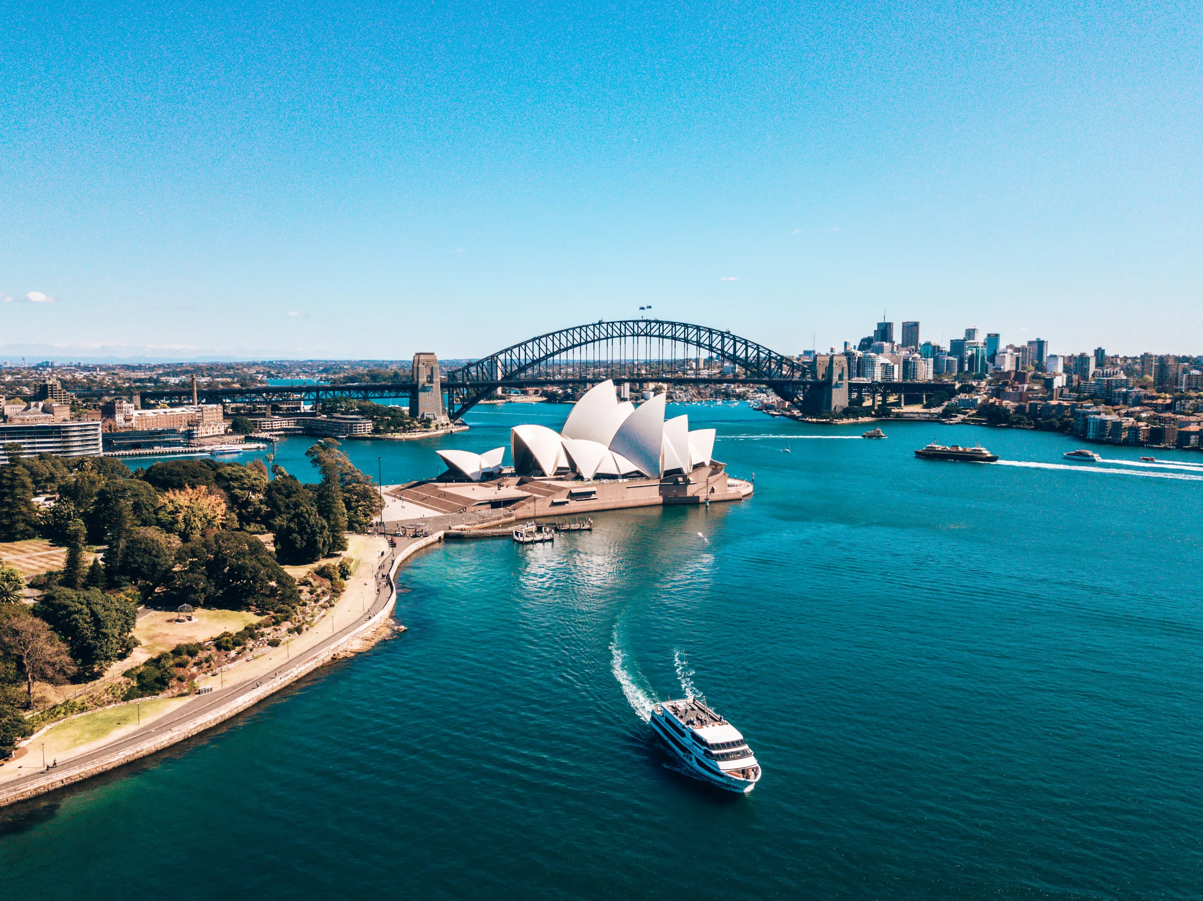 Sydney Harbour from above, with the Opera House and the Harbour Bridge
