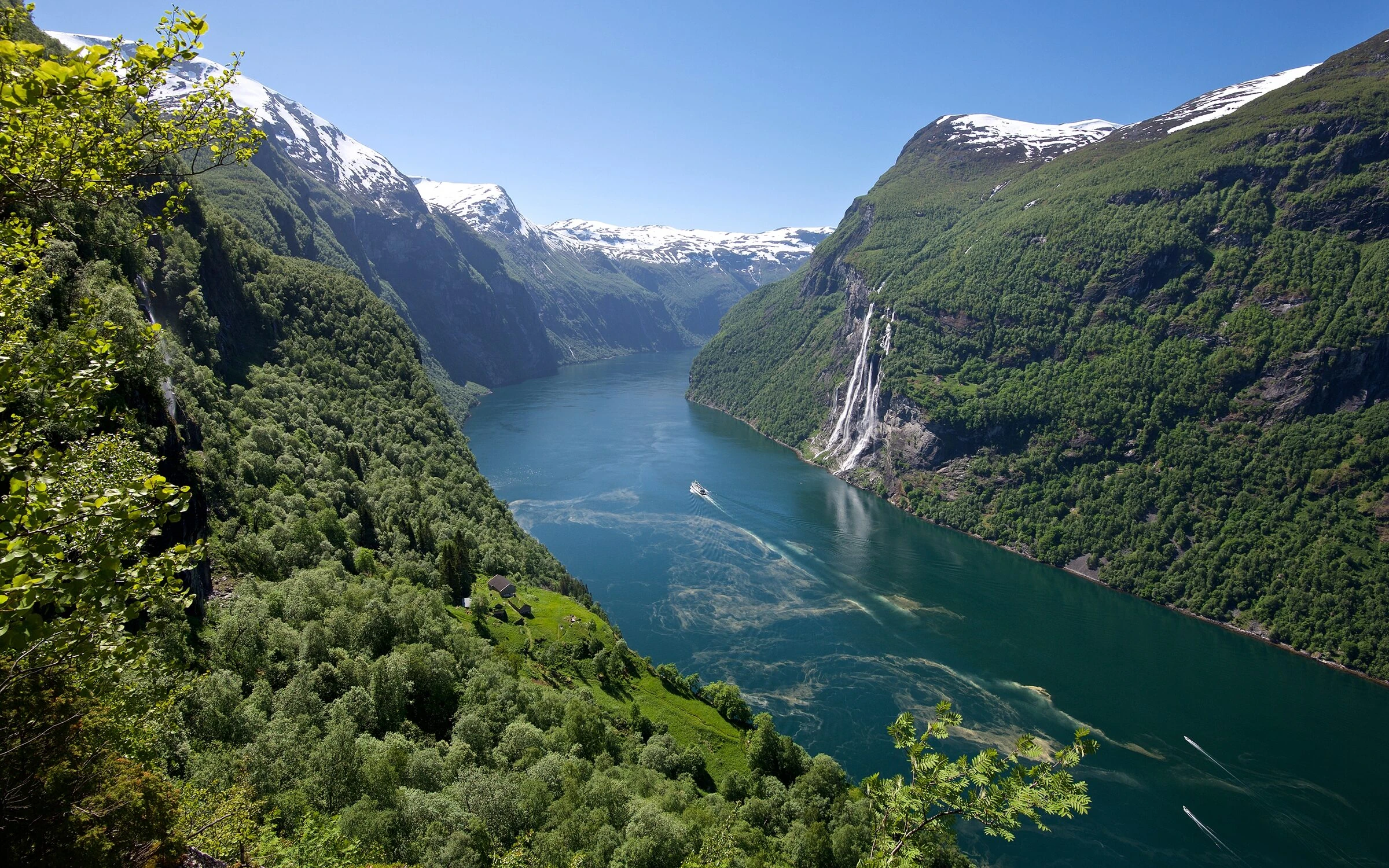 Kayaking on Storfjorden below the mountains