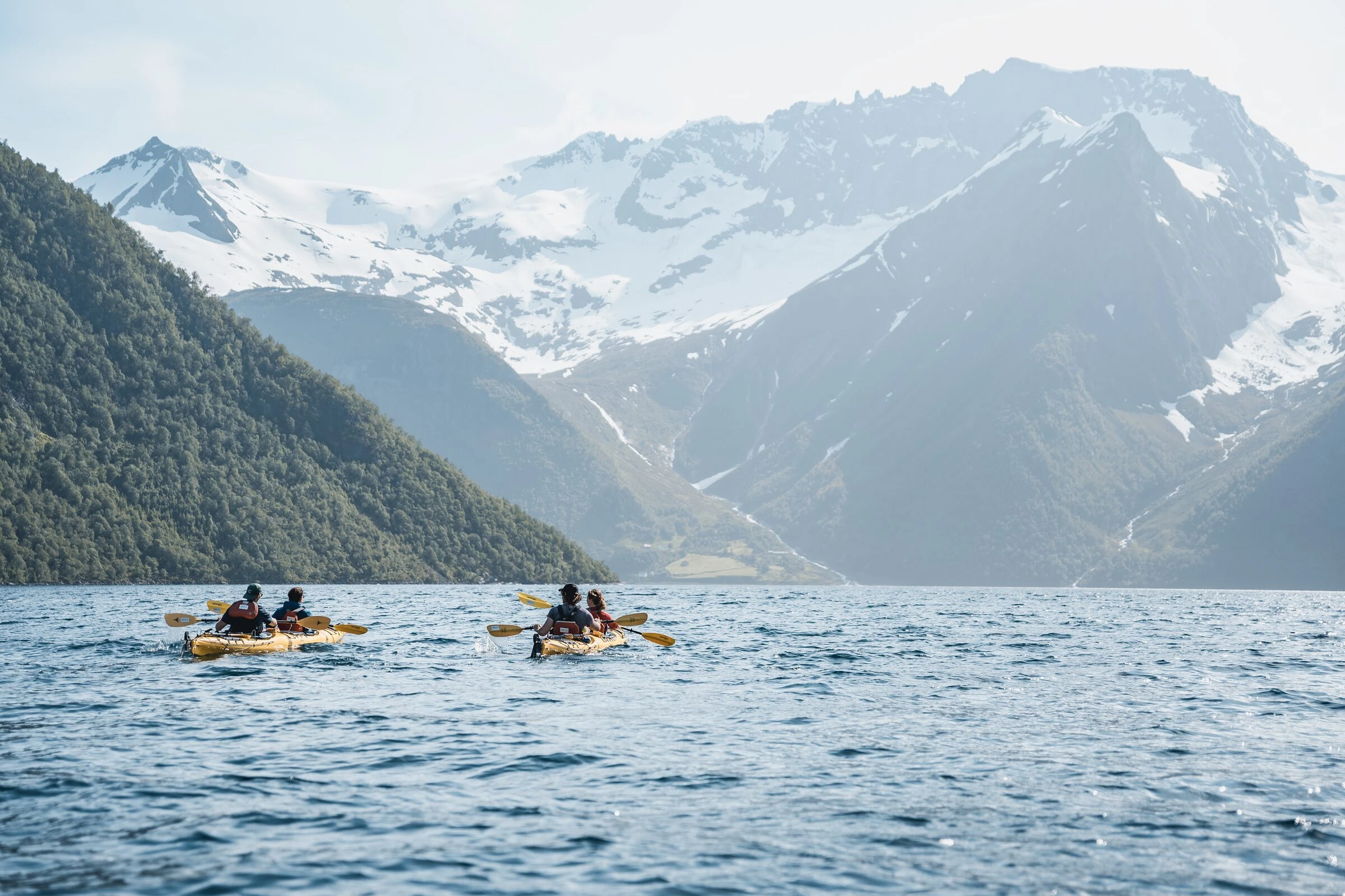 Kayaking on Storfjorden below the mountains