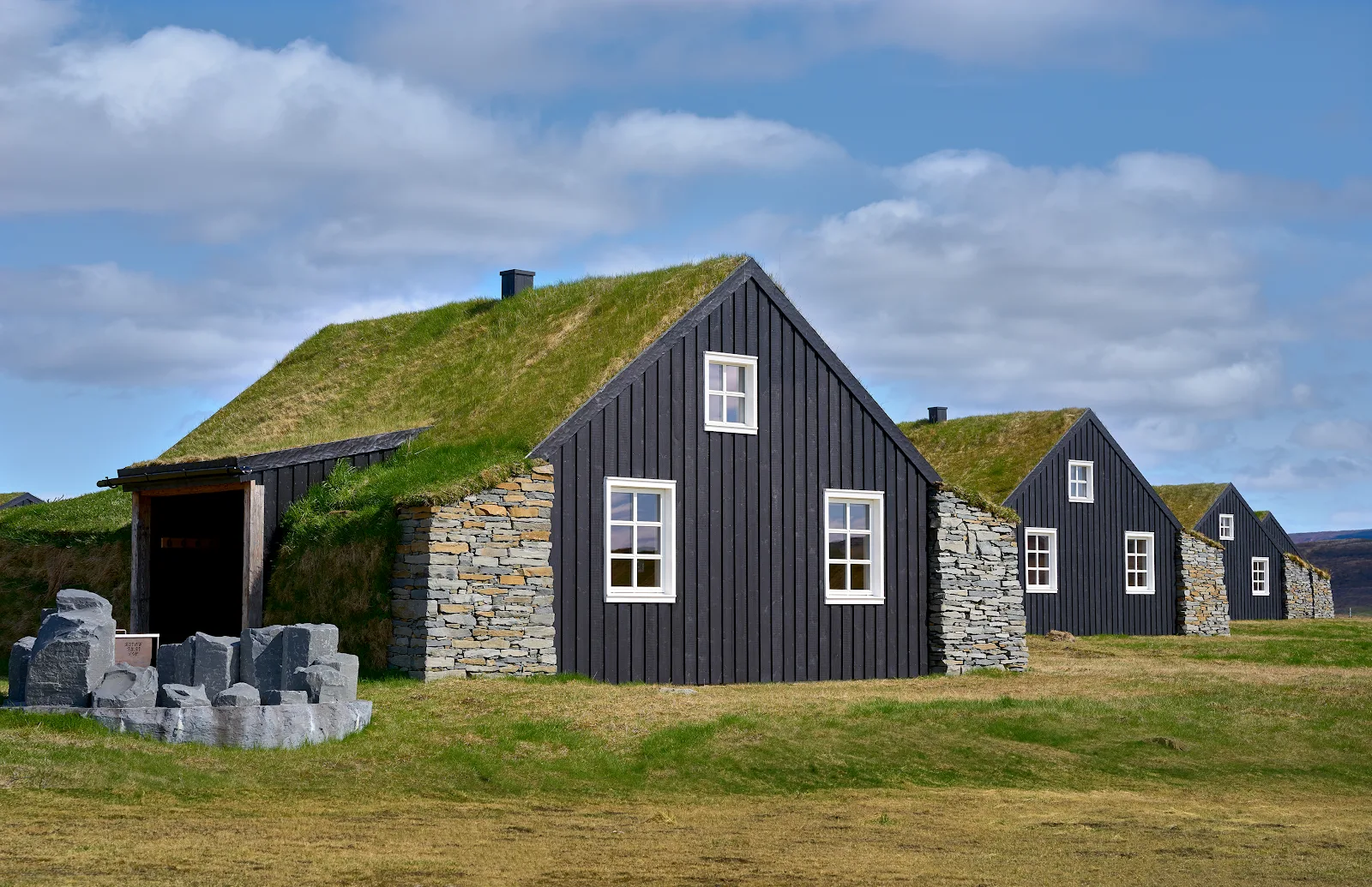 Turf-roofed cottages at Torfh&uacute;s Retreat