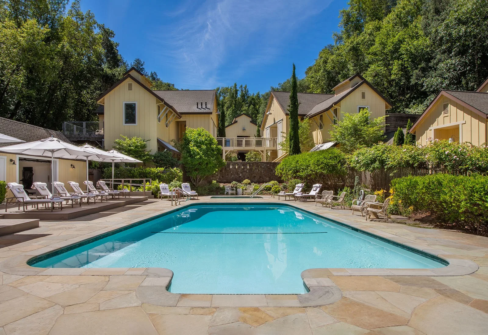 The pool and cottages at Farmhouse Inn, Forestville